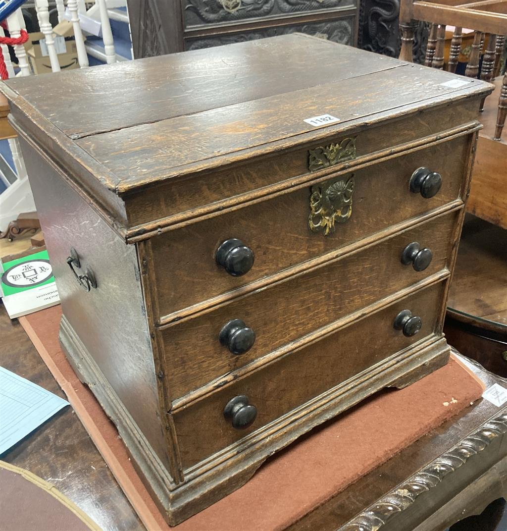 A Queen Anne oak commode, with dummy drawer front, width 46cm, depth 39cm, height 43cm